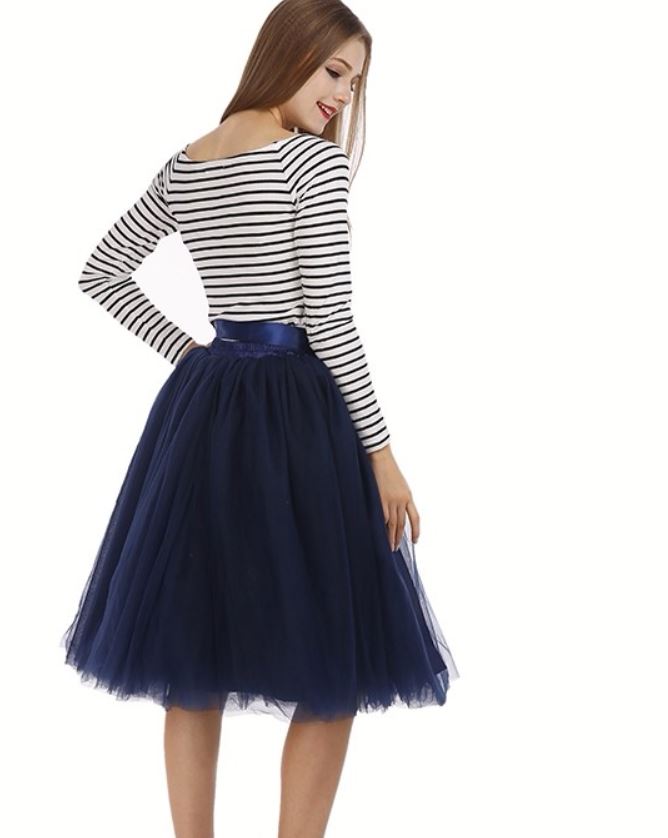 black top with navy blue skirt